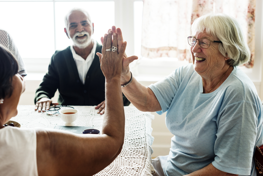 Types Of Nursing Home Abuse - Senior women giving each other high five